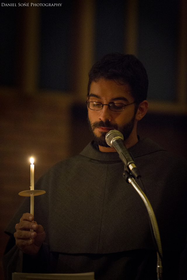 Brother Emanuel Vasconcelos, OFM chants the "O Sanctissima Anima" during the candlelight vigil portion of the Transitus of St. Francis.