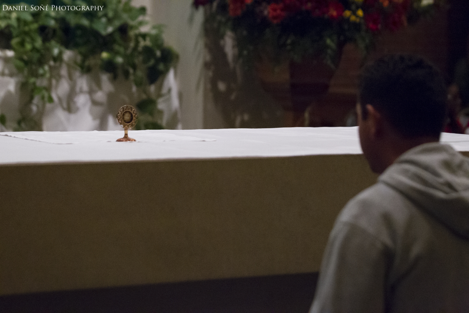 A man venerates a relic of St. Francis of Assisi at the end of the Transitus of St. Francis of Assisi at St. Camillus Church in Silver Spring, MD.