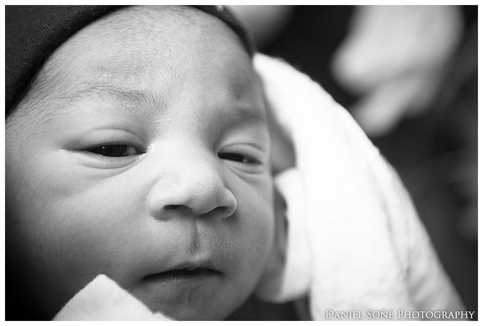 Newborn in my left hand, camera in my right.