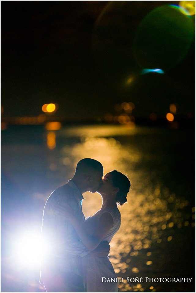 Epic wedding kiss under full moon. It was a blue moon at Higgs Beach in Key West.
